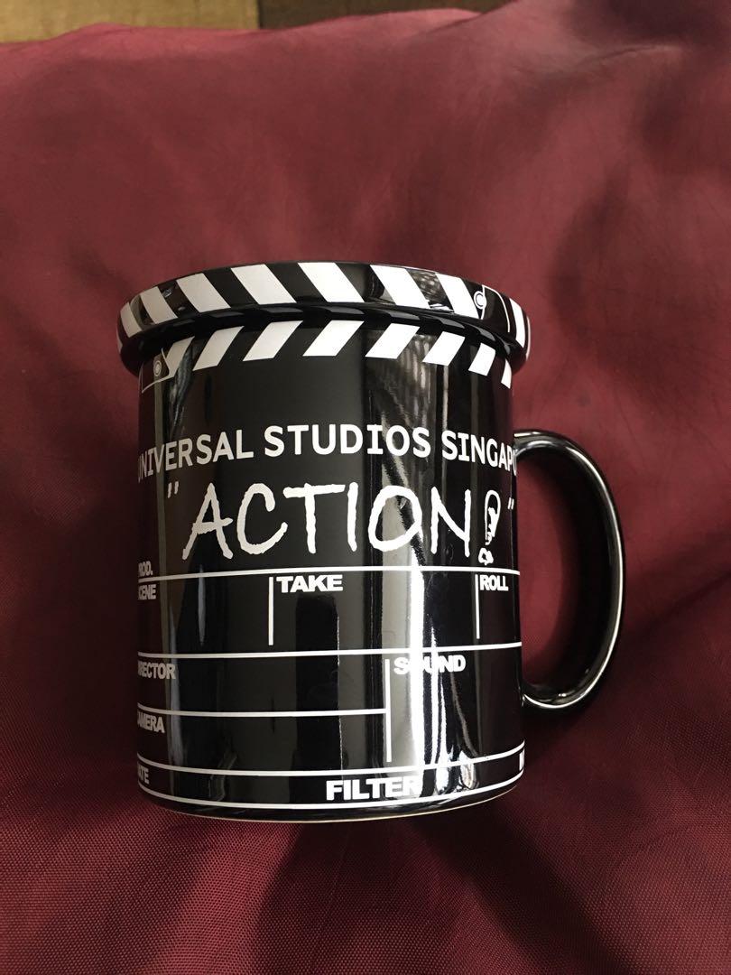 Universal Studios Singapore Mug (Category: Coffee & Tea Tableware) located in Quezon City. Submitted by crbphl (Listing ID 1113407975, Image 1). Description: Authentic Universal Studios (Singapore) Mug (original) with cover - Ideal for coffee, tea, soup - Lid/Cover can also be used as a Coaster Diameter is 3.5” Height is 4” Brand New Was bought at Universal Studios Singapore as a souvenir. Was never used. .