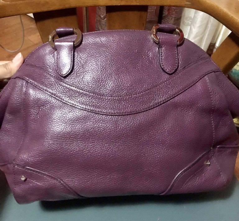 Original MCM Lioness Series Doctor's Bag in Dark Purple Handle, Women's  Fashion, Bags & Wallets, Cross-body Bags on Carousell