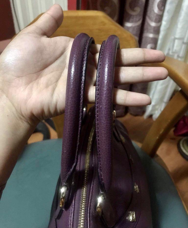 Original MCM Lioness Series Doctor's Bag in Dark Purple Handle, Women's  Fashion, Bags & Wallets, Cross-body Bags on Carousell