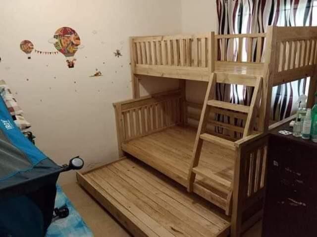 Wooden Double Deck with pullout bed 09498310053 (Category: Bed Frames & Mattresses) located in Quezon City. Submitted by leocarloswoodcrafts (Listing ID 1113566639, Image 1). Description: made from solid mahogany wood. FOAM NOT INCLUDED. Price may change depending on size, design, wood type use, varnish and/or color. We also accept made to order and customized wooden Furnitures Standard bed sizes: (in inches) 36x75 single size top bed 48x75 doubl