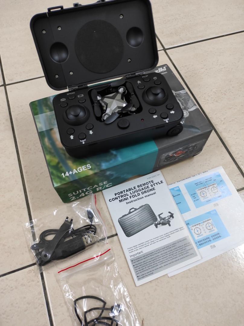 Portable remote control luggage style mini sales fold drone