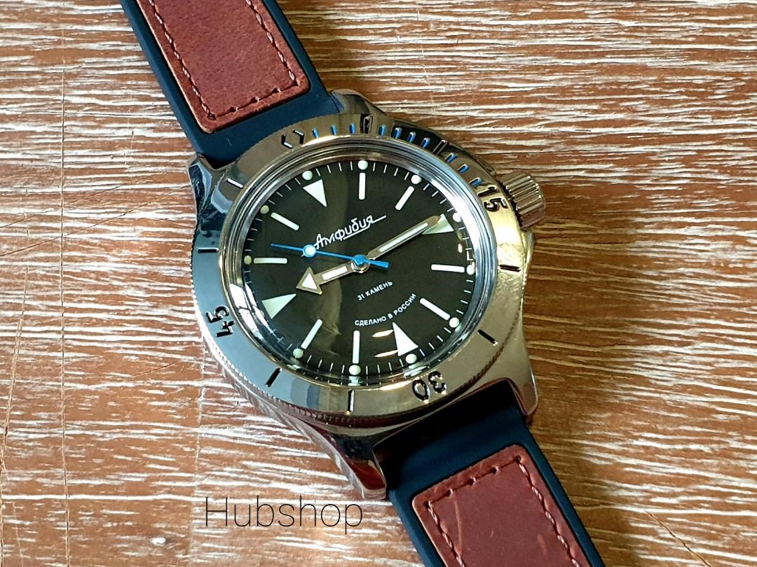Vostok Amphibia 120 Automatic Diver 200M with brown leather rubber straps add 12 Sweat resistant. Great dress watch too.Free delivery