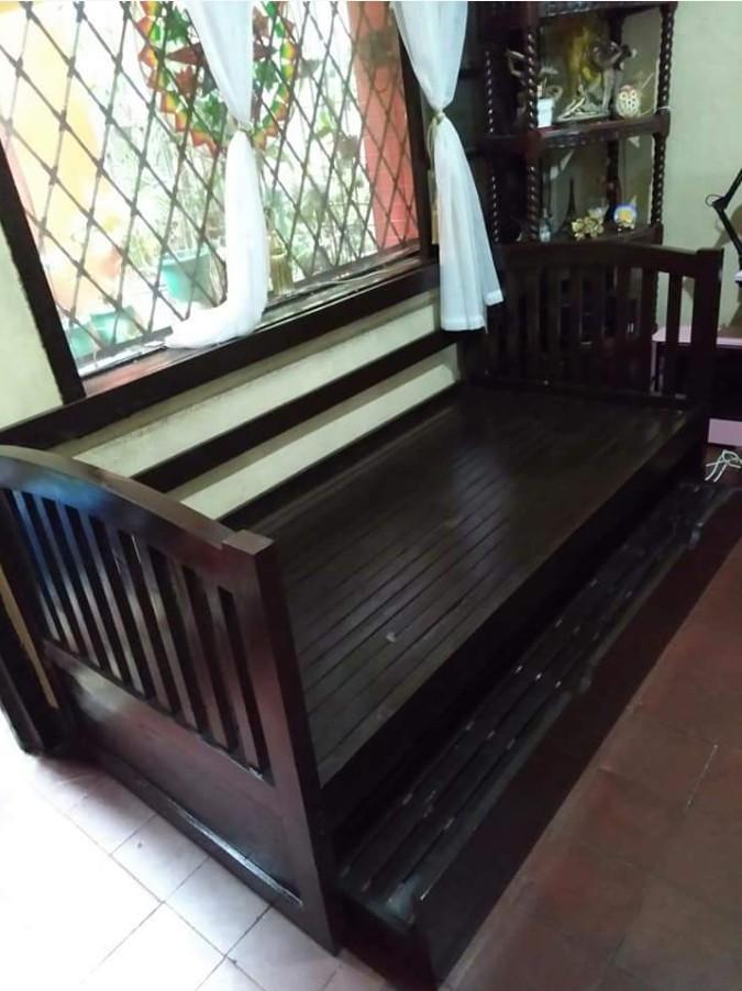 Wooden Sofa Day Bed w/ Pullover bed. 09498310053 (Category: Sofas) located in Quezon City. Submitted by leocarloswoodcrafts (Listing ID 1113860925, Image 1). Description: made from solid mahogany wood, HINDI KASAMA FOAM. Price may change depending on size, design, wood type use, varnish and/or color. We also accept made to order / customize design of Wooden furnitures More available sizes (in inches) 36x75 Single size 48x75 Double size 54x75 Full