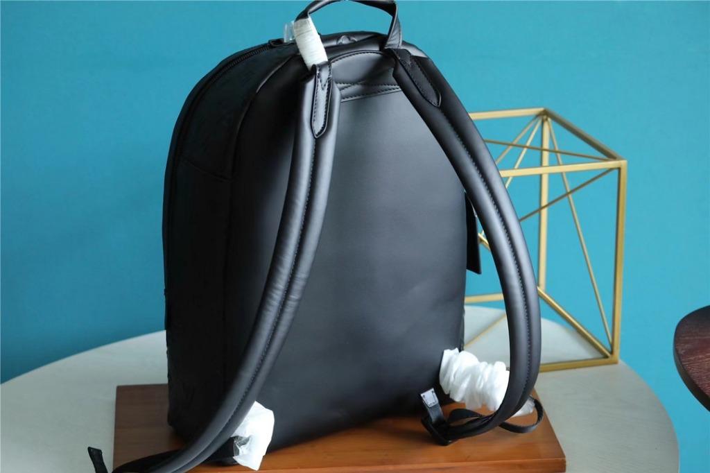 Louis Vuitton Armand Backpack Monogram Seal Cowhide Leather Bag