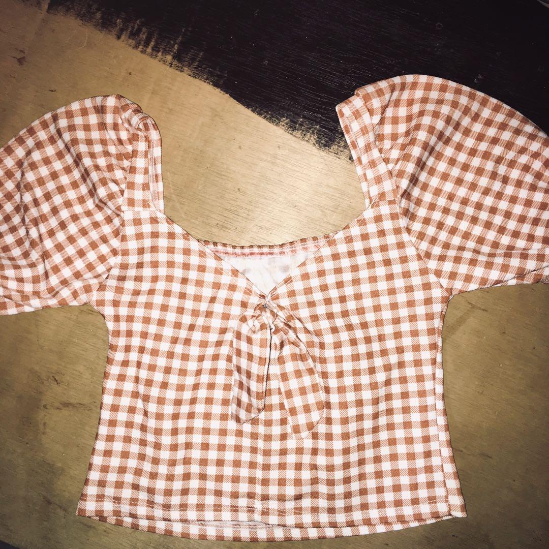 Crop Top (Category: Blouses) located in Taguig. Submitted by aaaaaaaik (Listing ID 1114009983, Image 1). Description: Checkered crop top with puffed sleeves Worn only once Fits Small - Xs Rfs, decluttering.