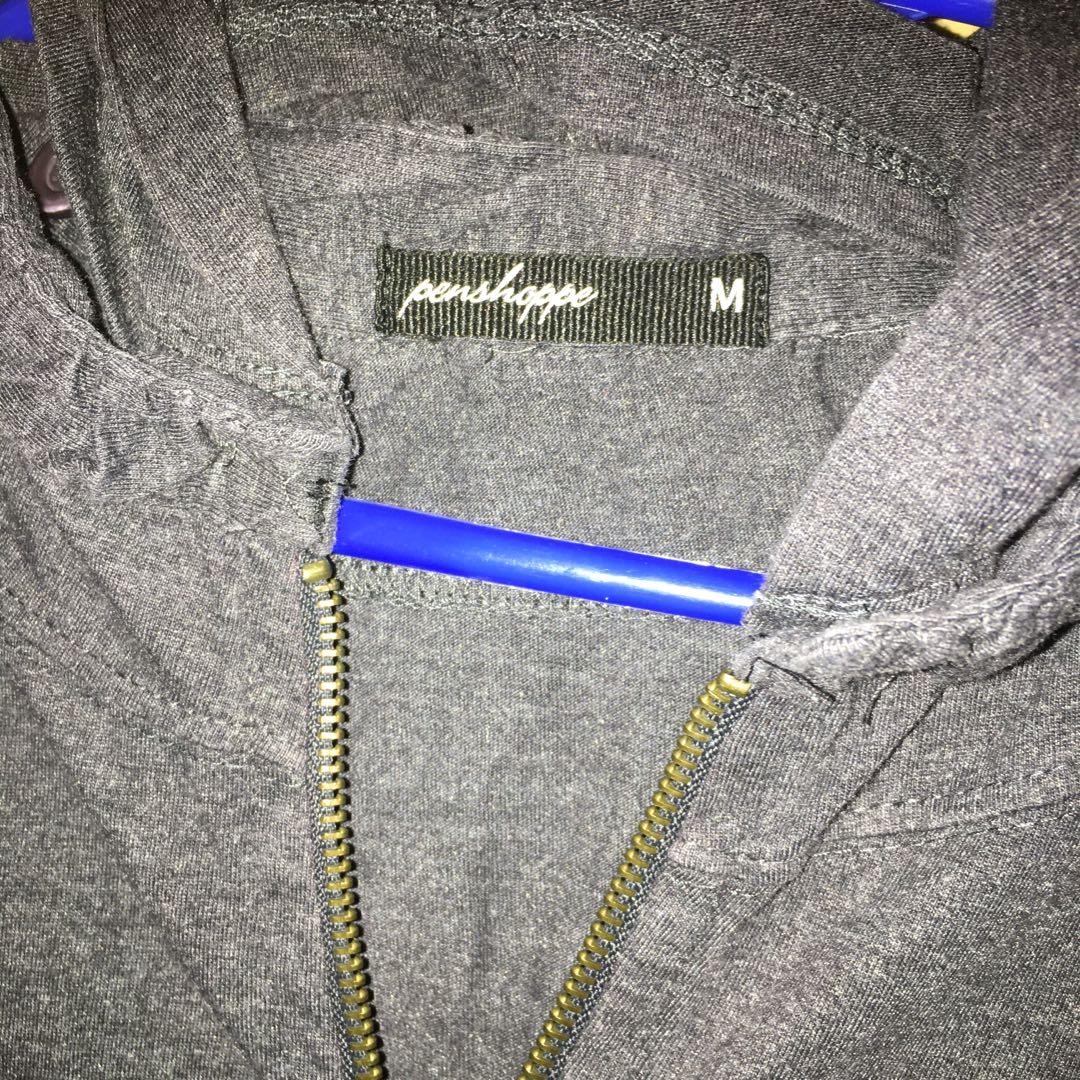Penshoppe Jacket w/ detachable hood (Category: Coats, Jackets and Outerwear) located in Taguig. Submitted by aaaaaaaik (Listing ID 1114010751, Image 2). Description: Dark gray jacket, 3/4 sleeves with pockets and detachable hood Fits Med- small frame.