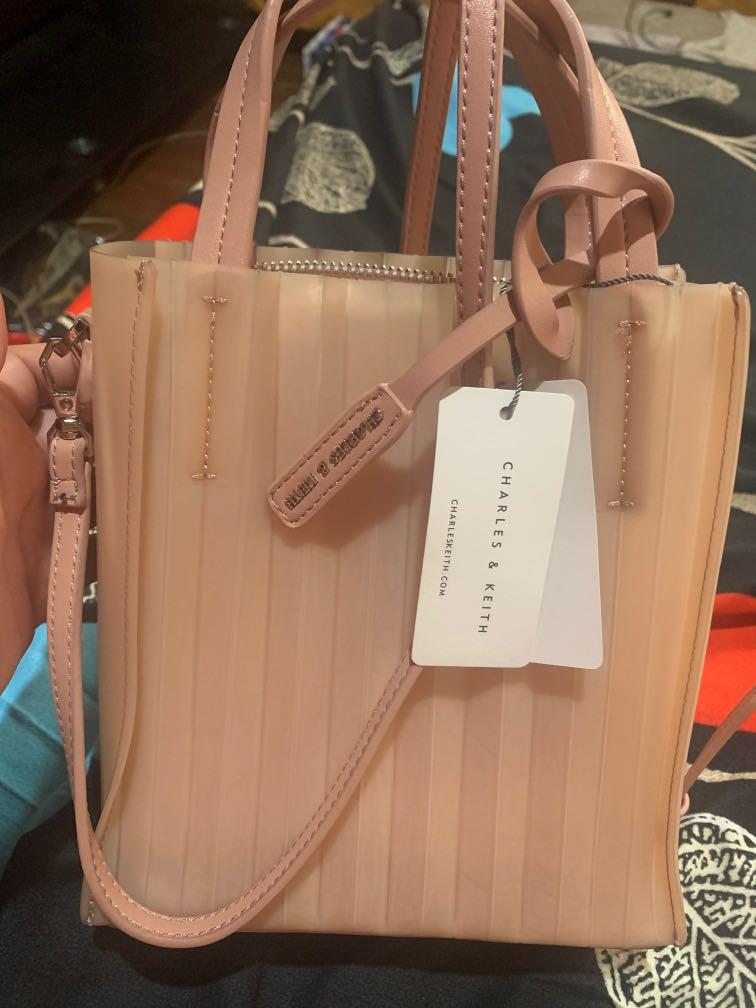 charles keith pink jelly sling bag