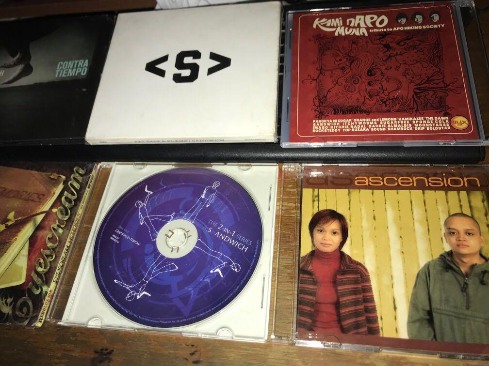 OPM CD set sale Sandwich etc (Category: CDs & DVDs) located in Cebu City. Submitted by zeo_99 (Listing ID 1114509585, Image 3). Description: 3 sandwich cds -850each- raimund marasigan band (eheads) (fat salt & flame never used) (comtra tiempo NM) (grip stand throw cd only VG) freebies pag lahatan binili: eyescream sealed new ascension (former rivermaya drums) like new kami napo sila cd (apo tribute feat parokya ni edgar kamikazee the dawn sandwic