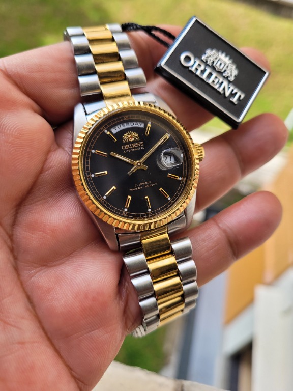 Orient president sale gold black