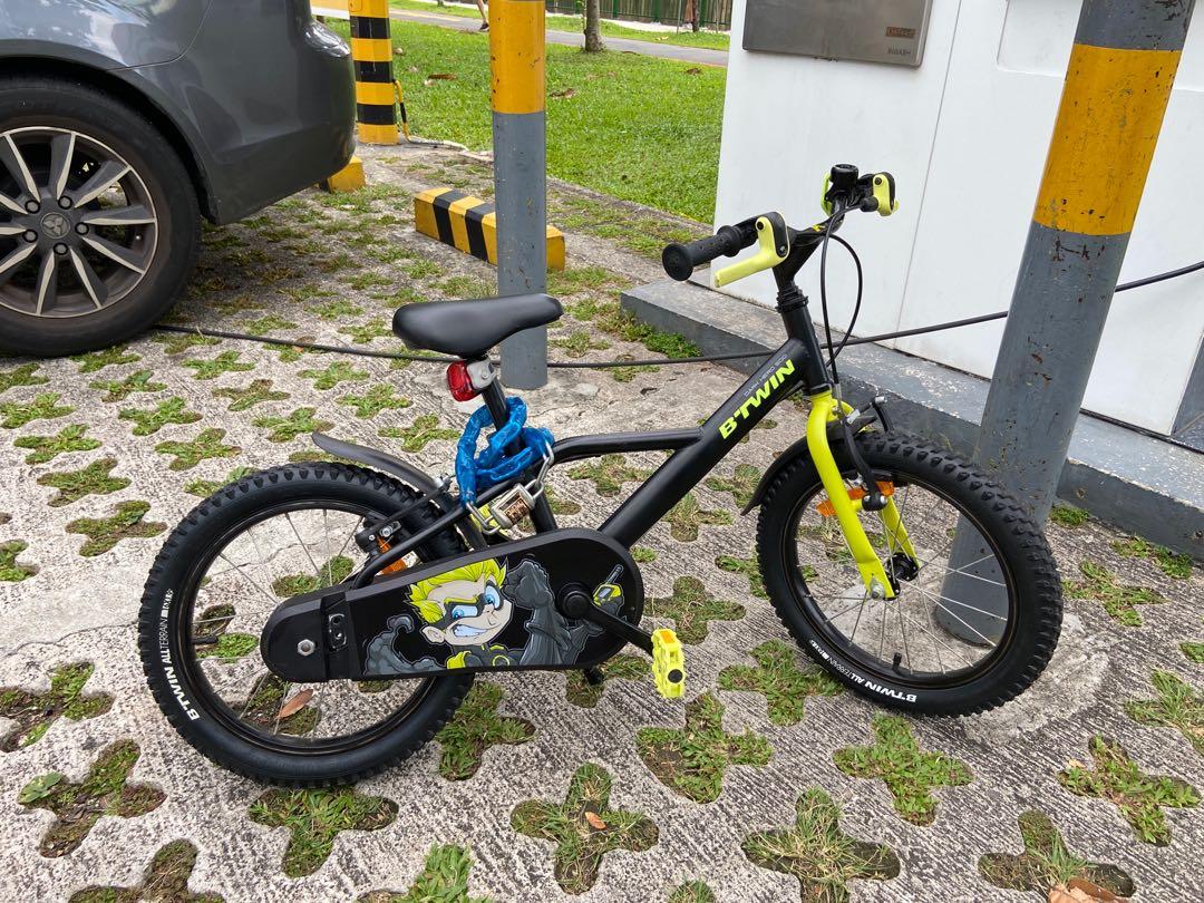 16 btwin kid s bicycle 4 6years with training wheels Sports Equipment Bicycles Parts Bicycles on Carousell