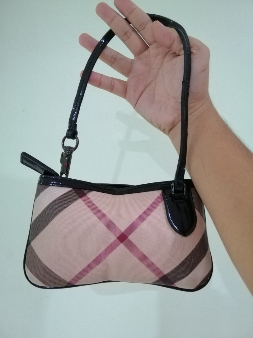 Burberry Wristlet, Luxury, Bags & Wallets on Carousell