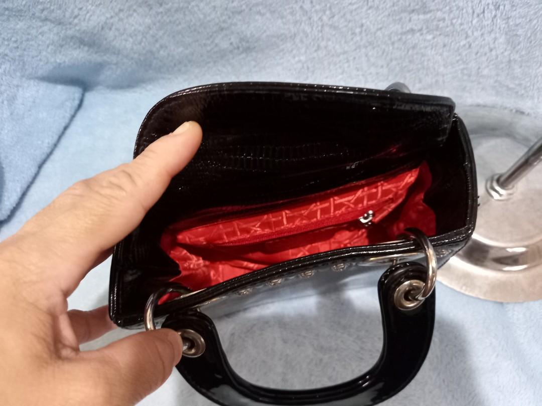 Christian Dior Inspo Mini Party Bag (Category: Luxury Bags & Wallets) located in Cainta. Submitted by zen_it_all (Listing ID 1114632530, Image 3). Description: CD Inspo handbag no strap slightly crooked bag posture with 2 small pull threads on the side plus sf.