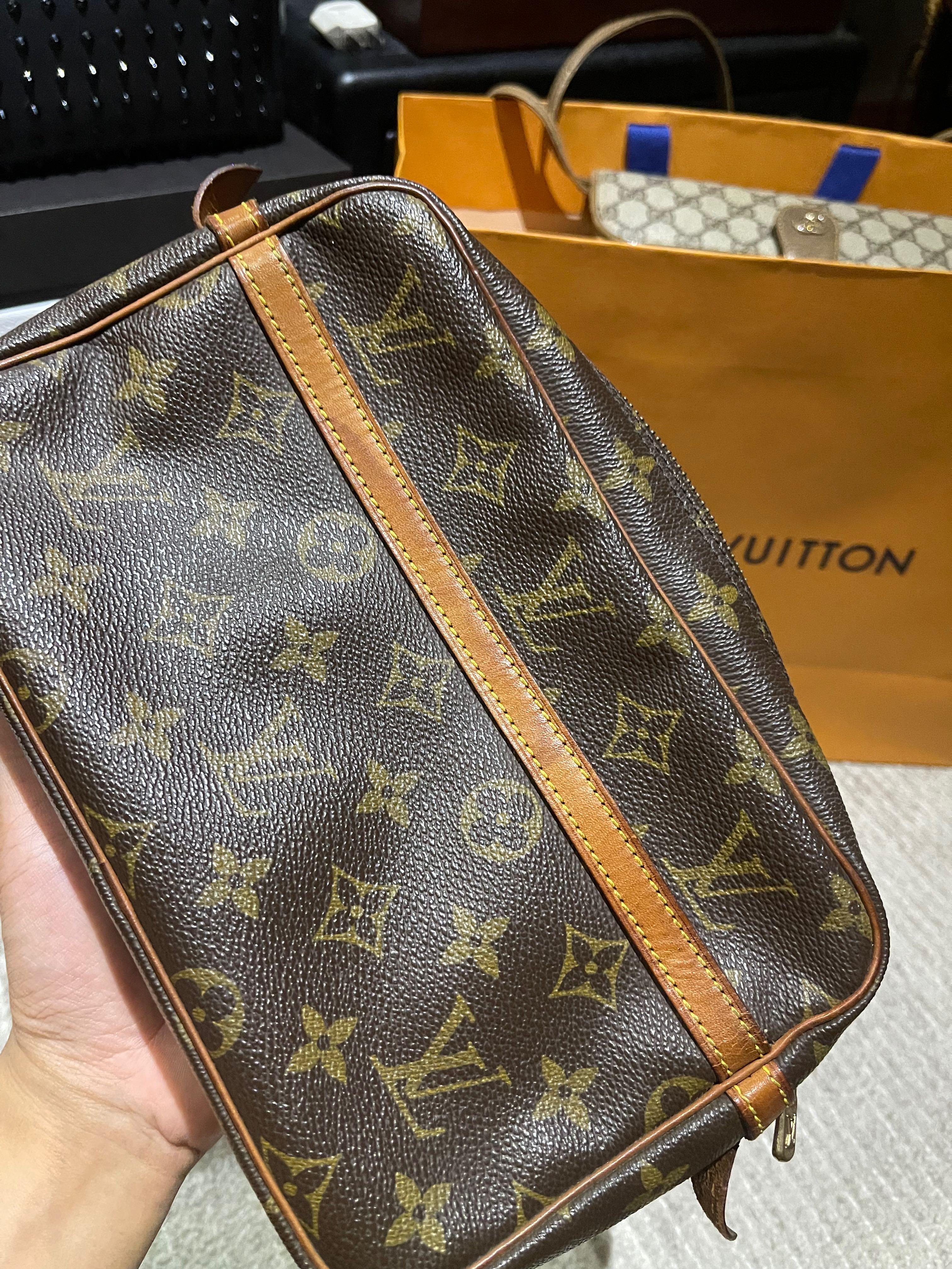 Louis Vuitton LV Clutch Bag (Category: Luxury Bags & Wallets) located in Pasig City. Submitted by ecrz19 (Listing ID 1114697574, Image 2). Description: Louis Vuitton Vintage Clutch Bag Rank B - old but no damage on monogram leather and piping, well taken care of with normal signs of usage over the years. Major flaw is the cracked vachetta leather (see pic 4-5) considering the age. Clean interior and no smell. Date code can be seen on pics provide