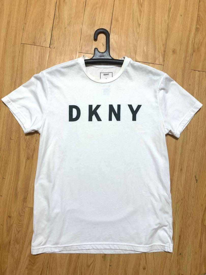White DKNY Tee (Category: Tshirts & Polo Shirts ) located in Paranaque City. Submitted by chippycoco (Listing ID 1114552922, Image 1). Description: Small - Medium Sf at Buyers expense..