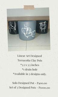 Artsy/Minimalist Line Art Terracotta Clay Pots