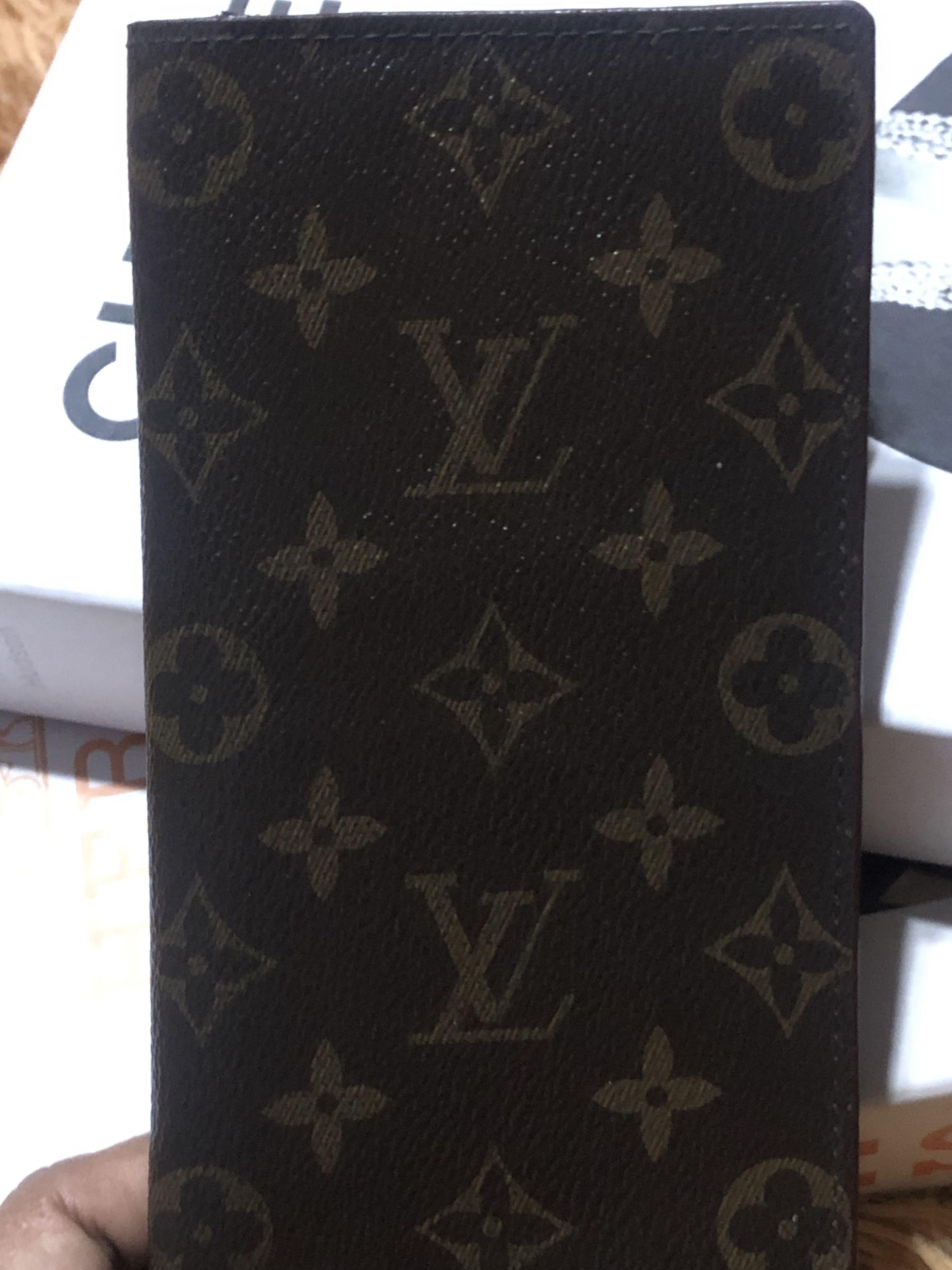 Authentic Louis Vuitton Vintage Monogram Brazza Wallet (Category: Luxury Bags & Wallets) located in Rosario. Submitted by myvinatgepieces (Listing ID 1111206062, Image 2). Description: Base Length: 4 in Height: 7.5 in Width: 0.75 in Date Code: 9105CT Authentic LOUIS VUITTON Monogram Brazza Wallet This stylish vertical organizer wallet is crafted of Louis Vuitton monogram toile canvas. This opens to an interior of cross-grain leather with card slo