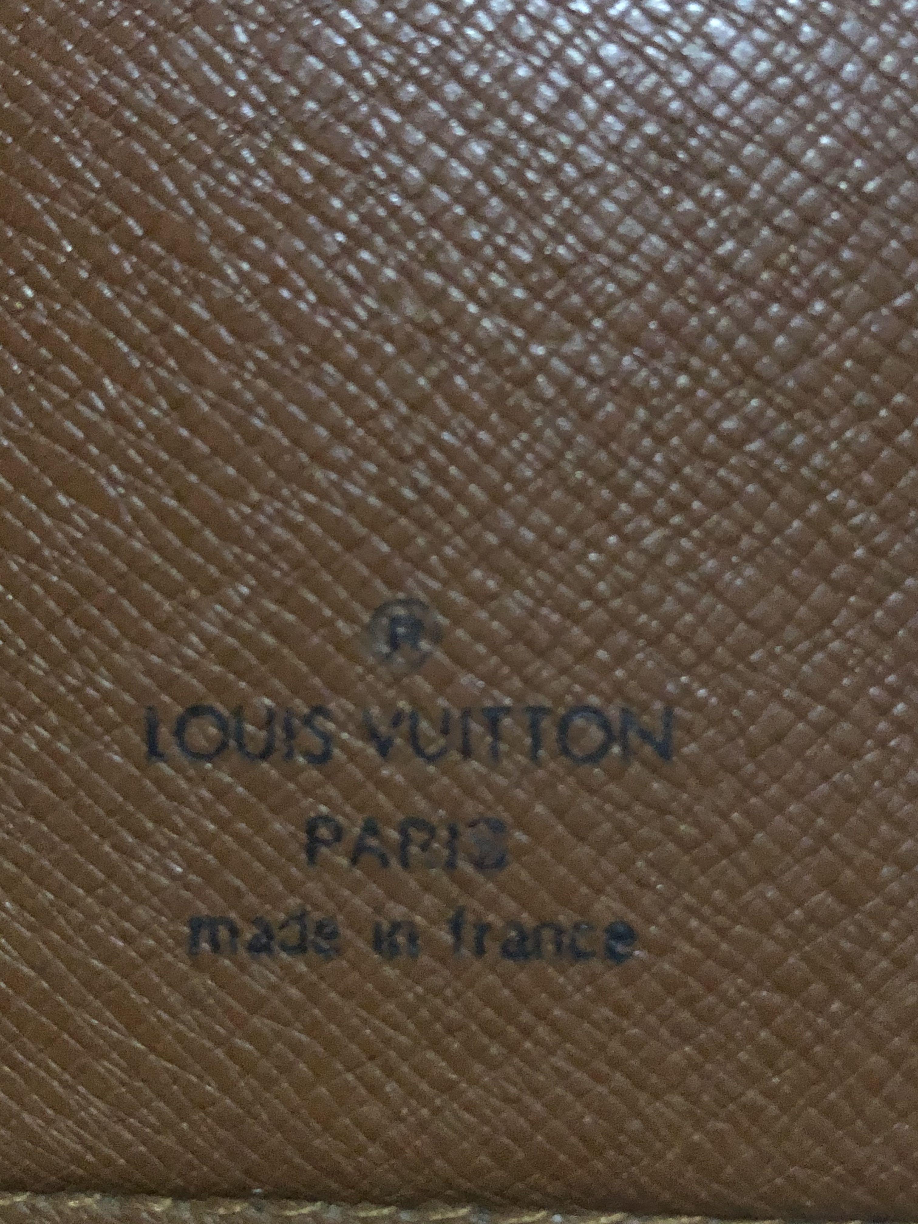 Authentic Louis Vuitton Vintage Monogram Brazza Wallet (Category: Luxury Bags & Wallets) located in Rosario. Submitted by myvinatgepieces (Listing ID 1111206062, Image 3). Description: Base Length: 4 in Height: 7.5 in Width: 0.75 in Date Code: 9105CT Authentic LOUIS VUITTON Monogram Brazza Wallet This stylish vertical organizer wallet is crafted of Louis Vuitton monogram toile canvas. This opens to an interior of cross-grain leather with card slo