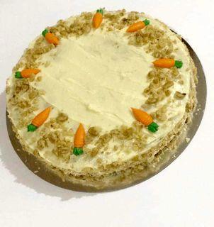 Carrot Cake with Cream Cheese Frosting, bestseller cake, moist, soft, filling, cream cheese frosting is a favorite, with pineapple bits, walnuts, carrots & raisins