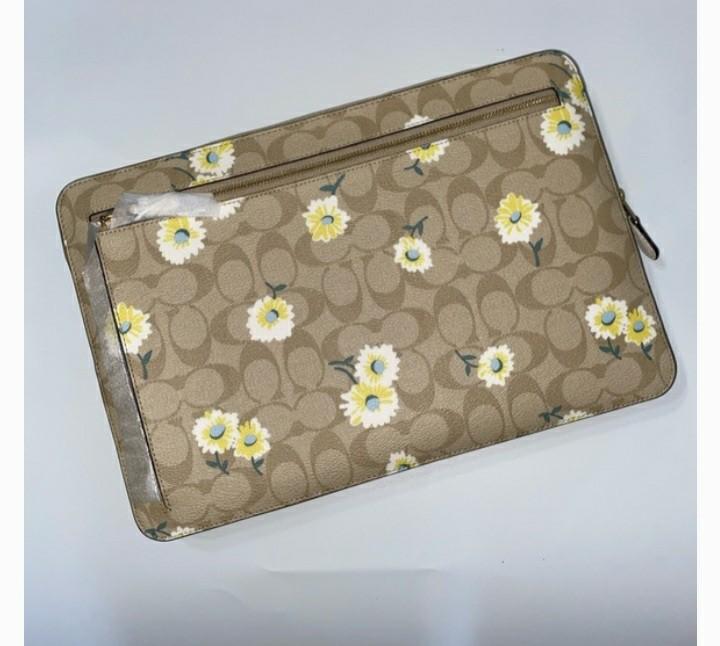 Coach Laptop Sleeve Daisy, Luxury, Bags & Wallets on Carousell
