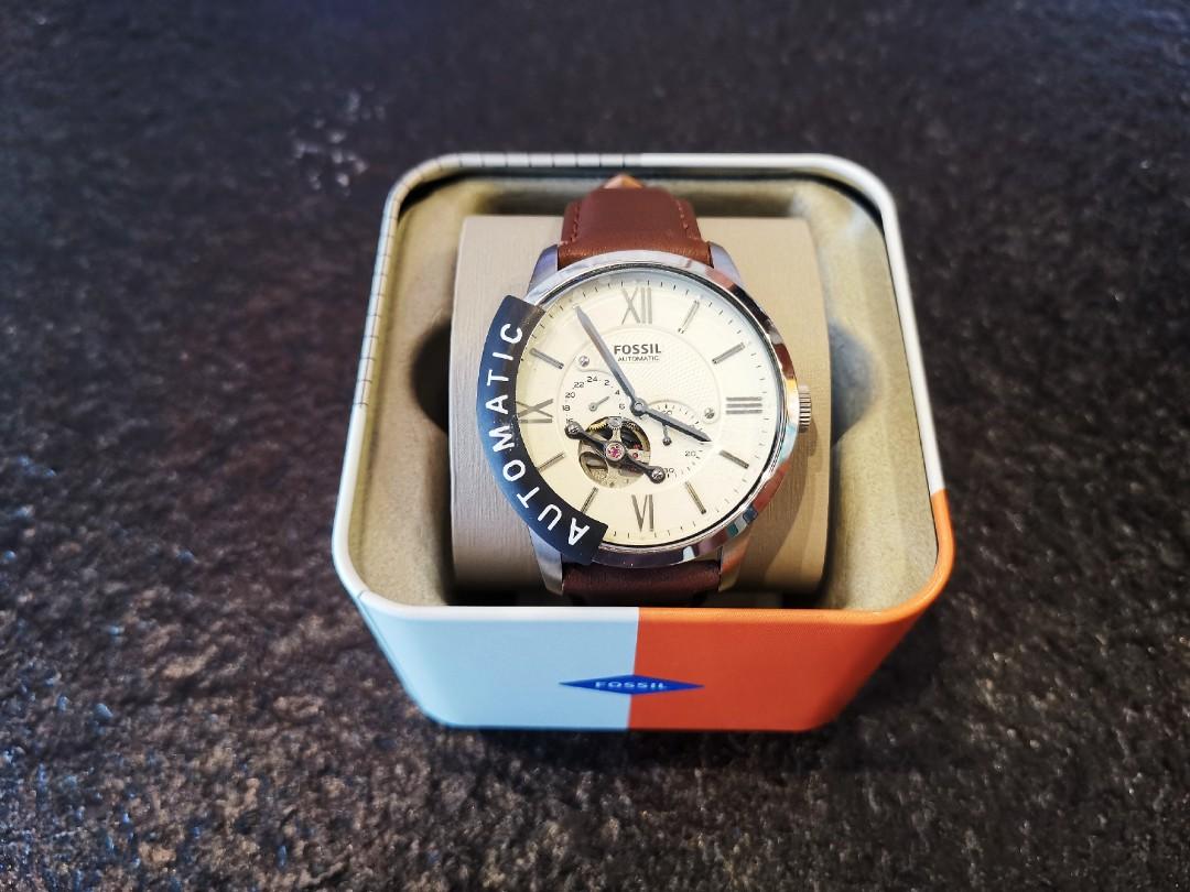 Fossil watch worth sales