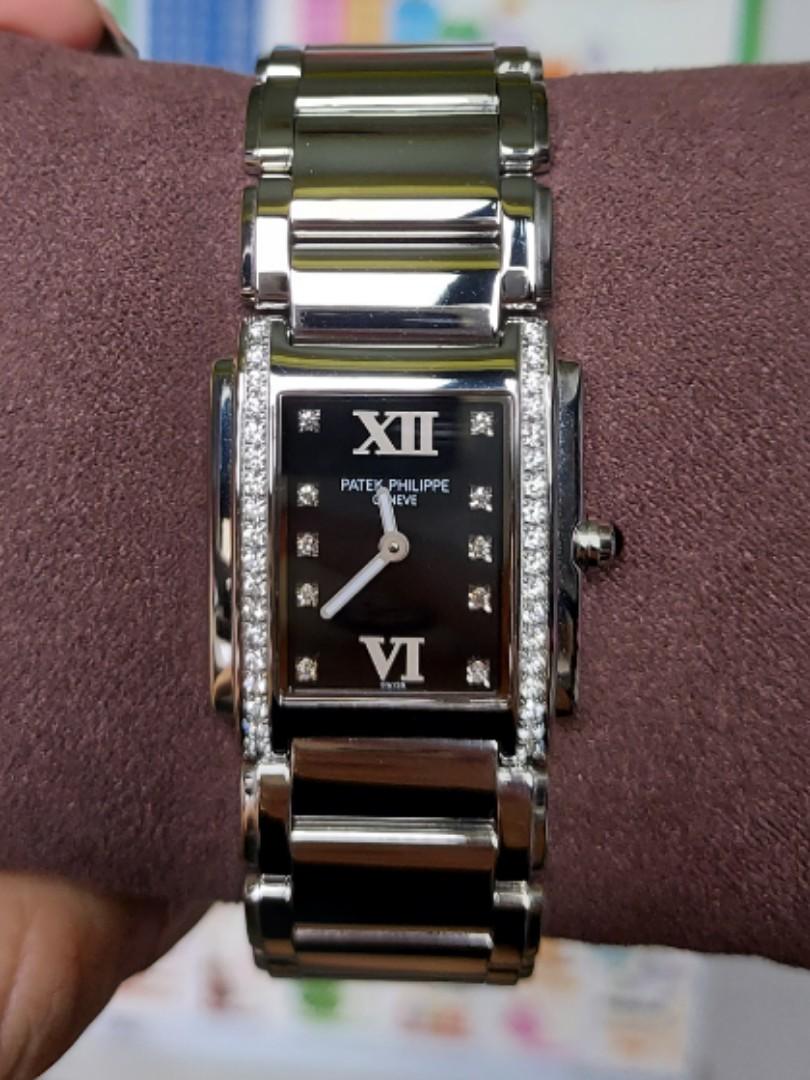 Patek Philippe TWENTY-4 stainless steel Black dial 4910/10A-001 (Category: Watches) located in Singapore. Submitted by dlhz78 (Listing ID 1114957587, Image 1). Description: Patek Philippe TWENTY-4 ladies watch for sale. Full set with cert and receipt. (Dec 2007) Discontinued model; high appreciation value Black dial with roman numeral 10 diamonds on dial markers 36 diamonds on bezel total 0.45 carats quartz movement convenient for ladies stainles