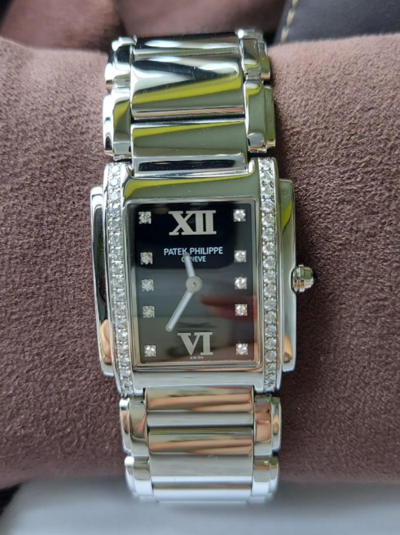 Patek Philippe TWENTY-4 stainless steel Black dial 4910/10A-001 (Category: Watches) located in Singapore. Submitted by dlhz78 (Listing ID 1114957587, Image 2). Description: Patek Philippe TWENTY-4 ladies watch for sale. Full set with cert and receipt. (Dec 2007) Discontinued model; high appreciation value Black dial with roman numeral 10 diamonds on dial markers 36 diamonds on bezel total 0.45 carats quartz movement convenient for ladies stainles