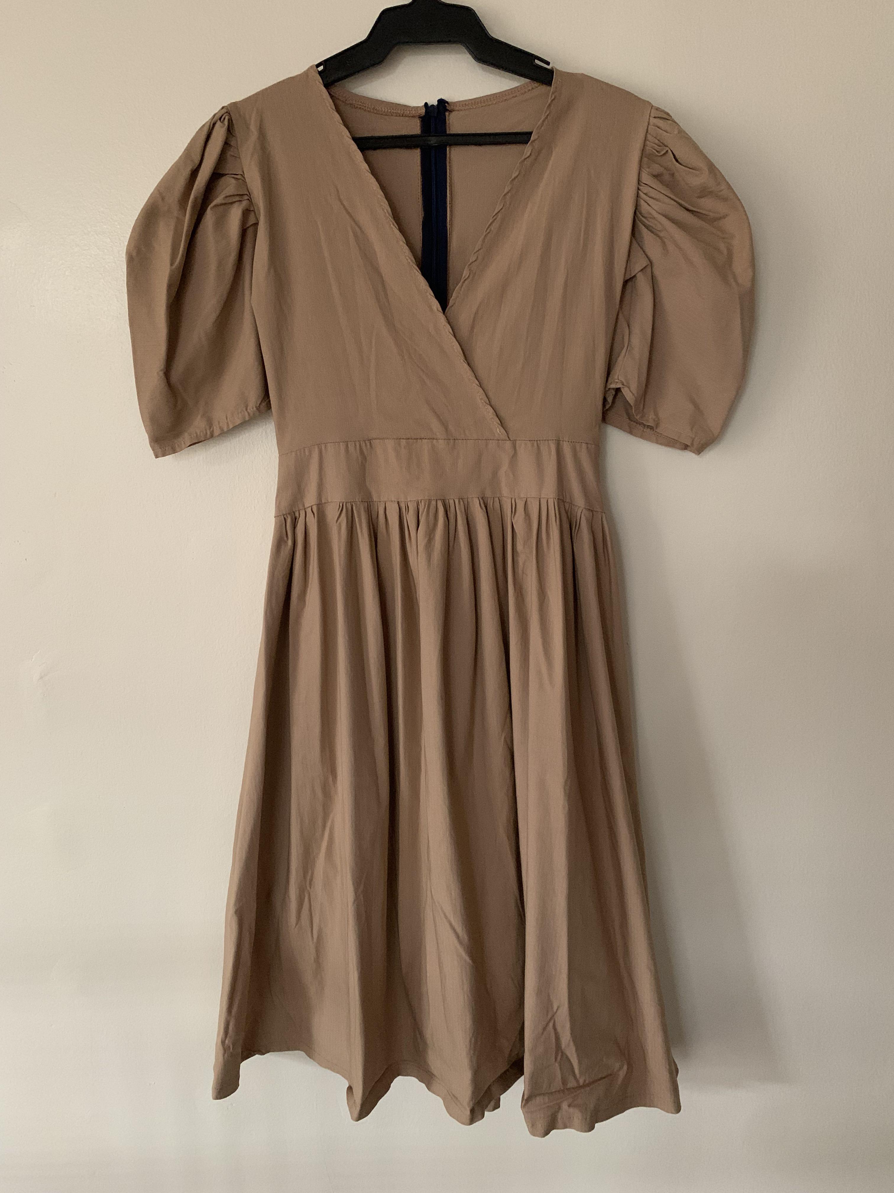 Peanut Brown Puff Sleeves Dress (Category: Dresses) located in Quezon City. Submitted by 3cshub (Listing ID 1115013501, Image 1). Description: Size: S-M - never been used but no tag Price is still negotiable. Message me for more details! :).