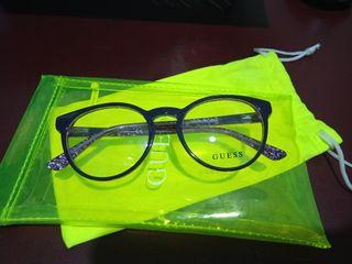 Purple sparkly GUESS glasses for kids