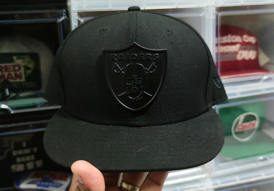 Raiders metal shield hat store