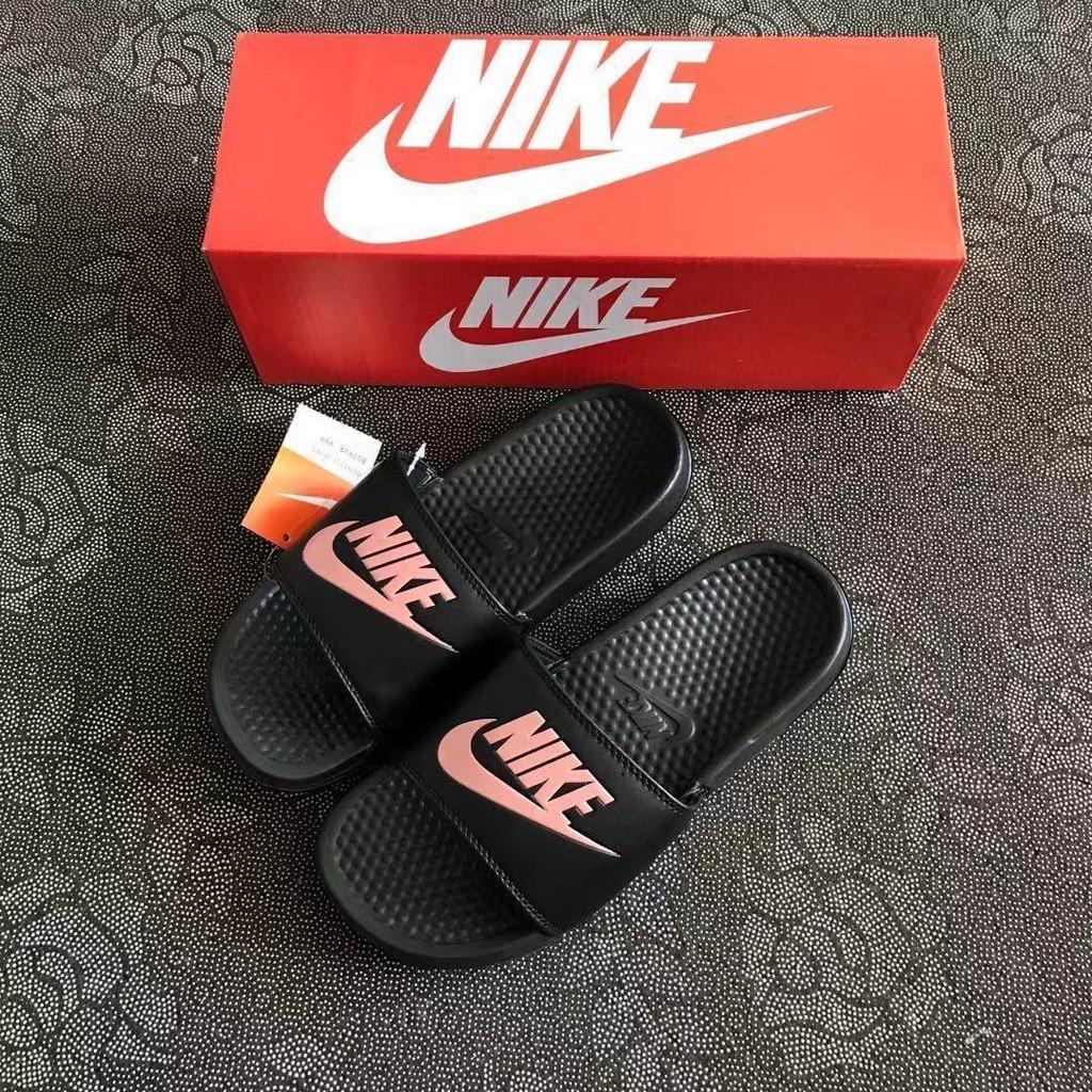 Nike sandals gold logo sales
