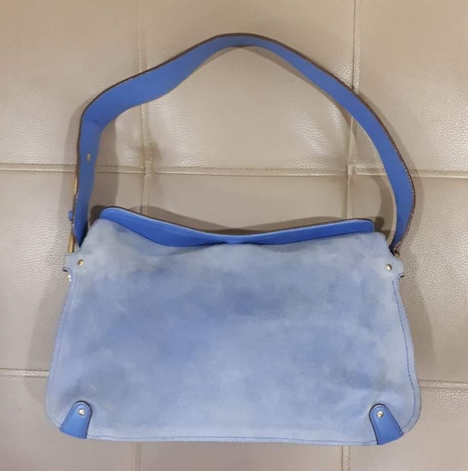 Salvatore Ferragamo Hobo Bag (Category: Luxury Bags & Wallets) located in Taguig. Submitted by esa.agustin (Listing ID 1115468841, Image 1). Description: Original Salvatore Ferragamo blue suede body and leather strap. With care card. Made in Italy..