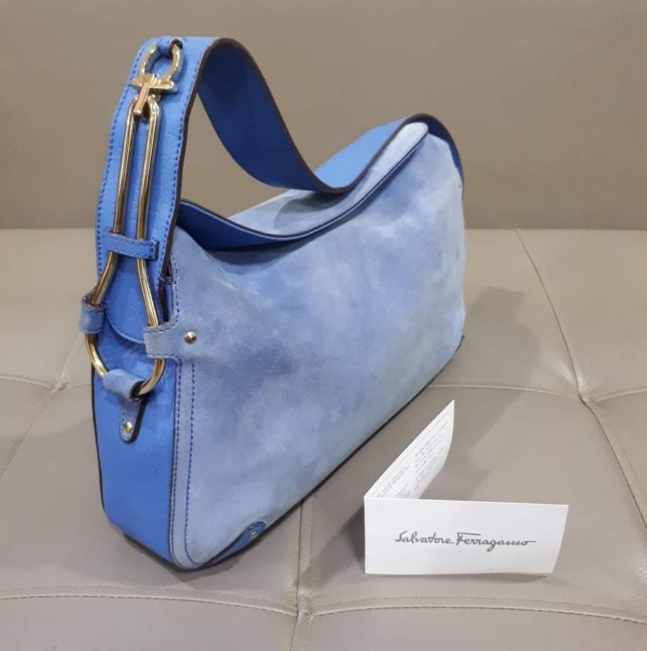 Salvatore Ferragamo Hobo Bag (Category: Luxury Bags & Wallets) located in Taguig. Submitted by esa.agustin (Listing ID 1115468841, Image 2). Description: Original Salvatore Ferragamo blue suede body and leather strap. With care card. Made in Italy..