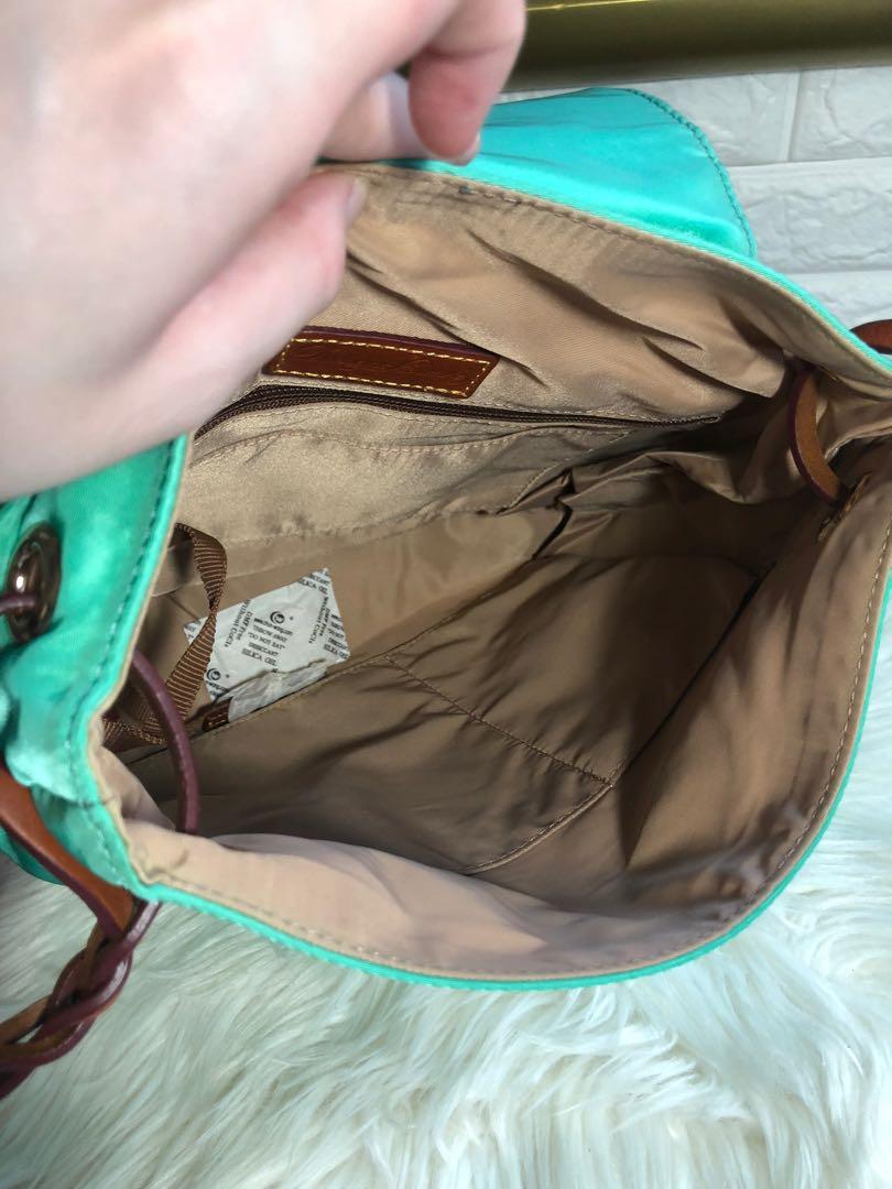 Mint green dooney and sale bourke
