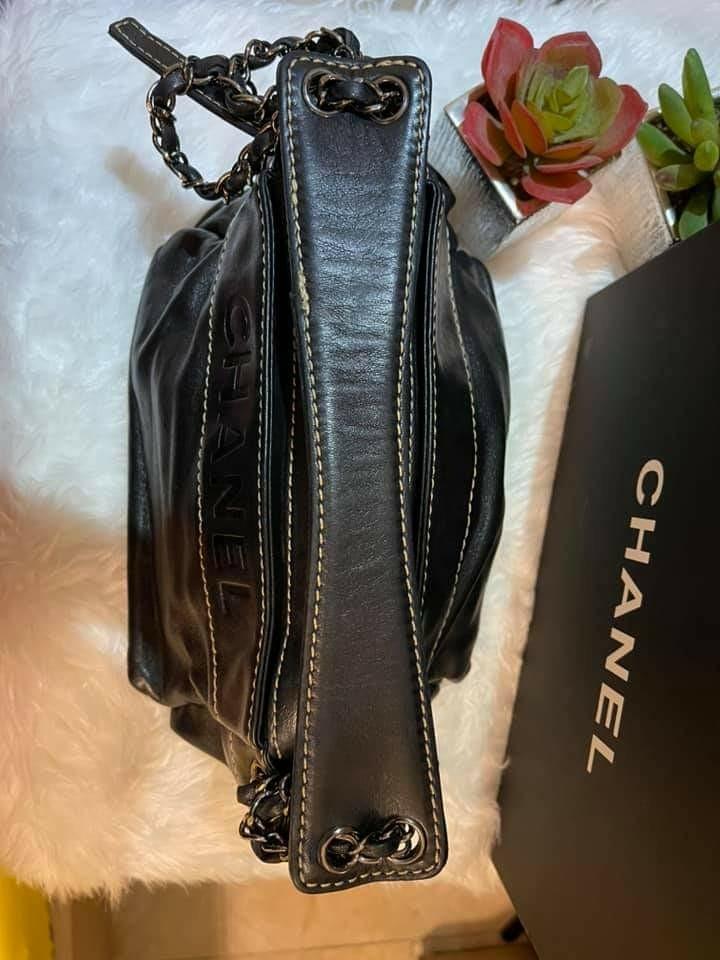 Sold at Auction: Chanel: A Black Lambskin LAX Accordian Camera Bag, 2005 /2006