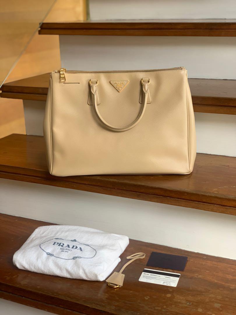 Prada Saffiano (Category: Luxury Bags & Wallets) located in Quezon City. Submitted by alysstrade (Listing ID 1115495449, Image 2). Description: - excellent condition - saffiano leather - with dustbag and authentication ID card .