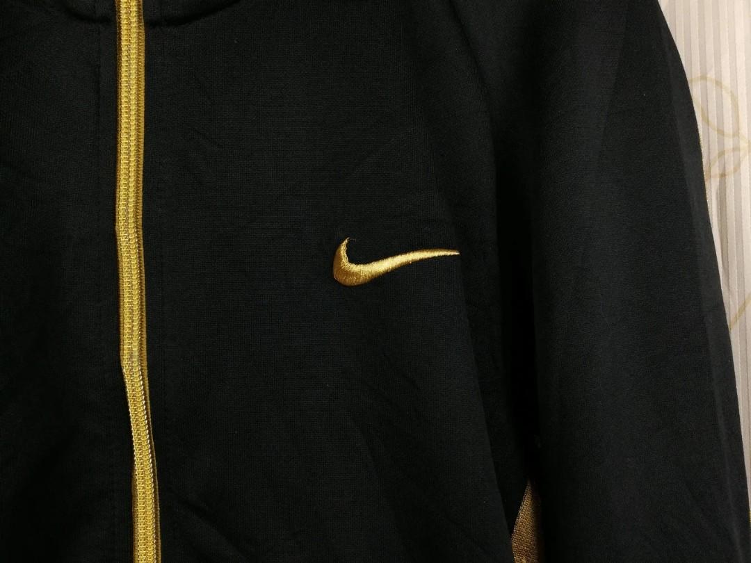 black and gold nike swoosh
