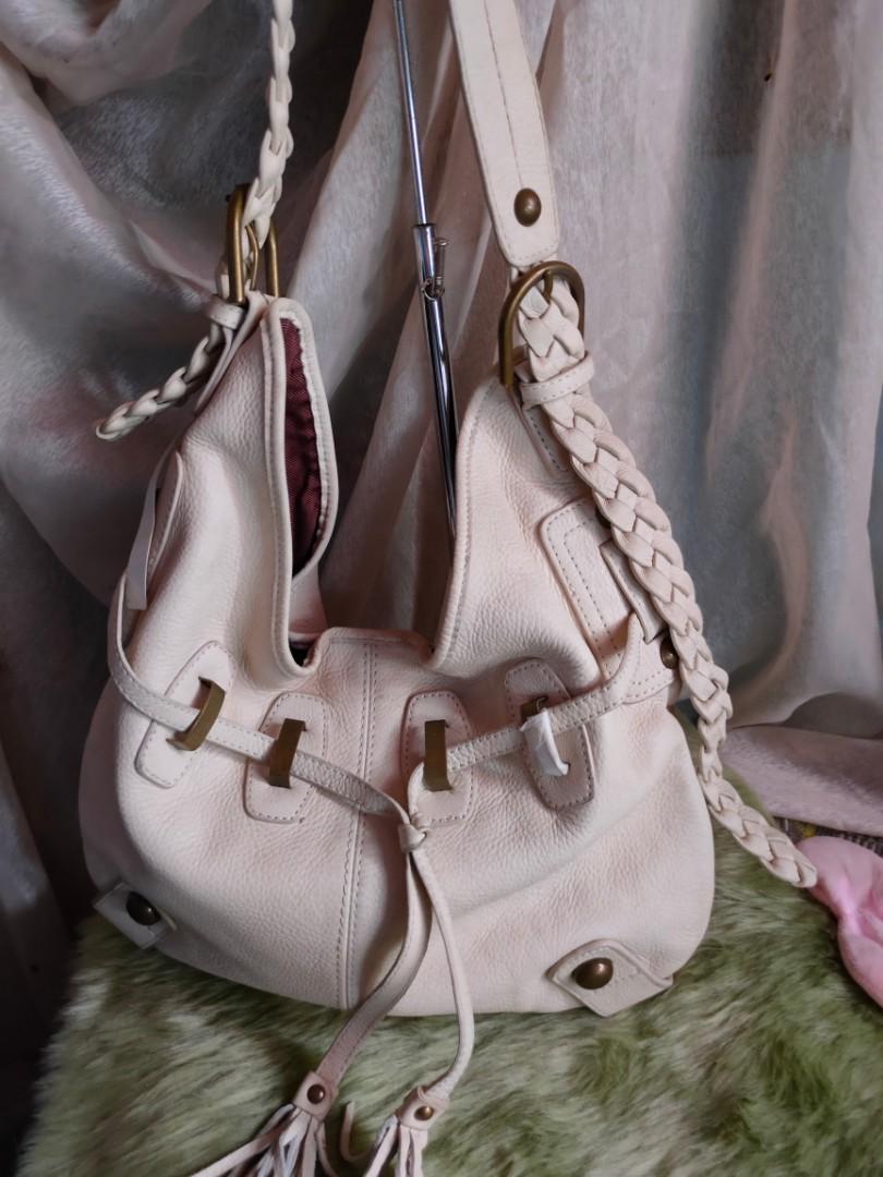Adriennne Vittadini Vintage leather (Category: Sling Bags) located in Bayombong. Submitted by jacqueshop (Listing ID 1115710203, Image 1). Description: Adrienne vittadini vintage leather cream color adjustable sling 37 cm x 37cm good as new.