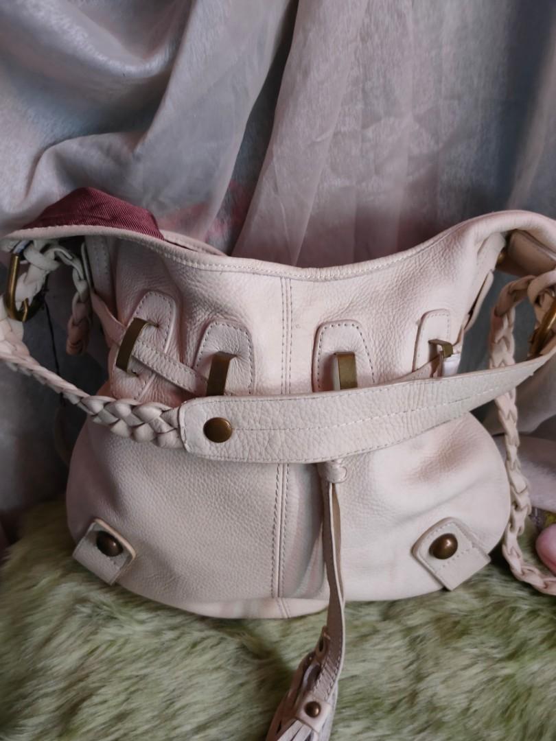 Adriennne Vittadini Vintage leather (Category: Sling Bags) located in Bayombong. Submitted by jacqueshop (Listing ID 1115710203, Image 3). Description: Adrienne vittadini vintage leather cream color adjustable sling 37 cm x 37cm good as new.