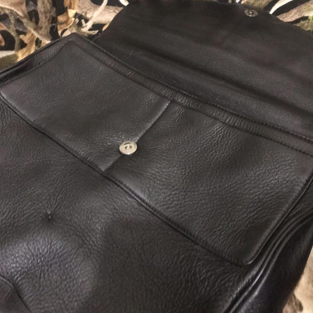 Mook Laptop Document Bag (Category: Briefcases) located in Manila. Submitted by shopaholic_gurl (Listing ID 1115723748, Image 3). Description: In excellent used condition No sling Multiple compartment approximately measure 17x14in sold exactly as seen in pics all pics posted Genuine leather with serial code.