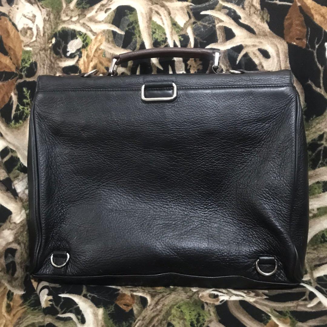 Mook Laptop Document Bag (Category: Briefcases) located in Manila. Submitted by shopaholic_gurl (Listing ID 1115723748, Image 2). Description: In excellent used condition No sling Multiple compartment approximately measure 17x14in sold exactly as seen in pics all pics posted Genuine leather with serial code.