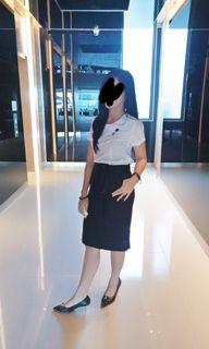 Office Span/Black Skirt The Executive