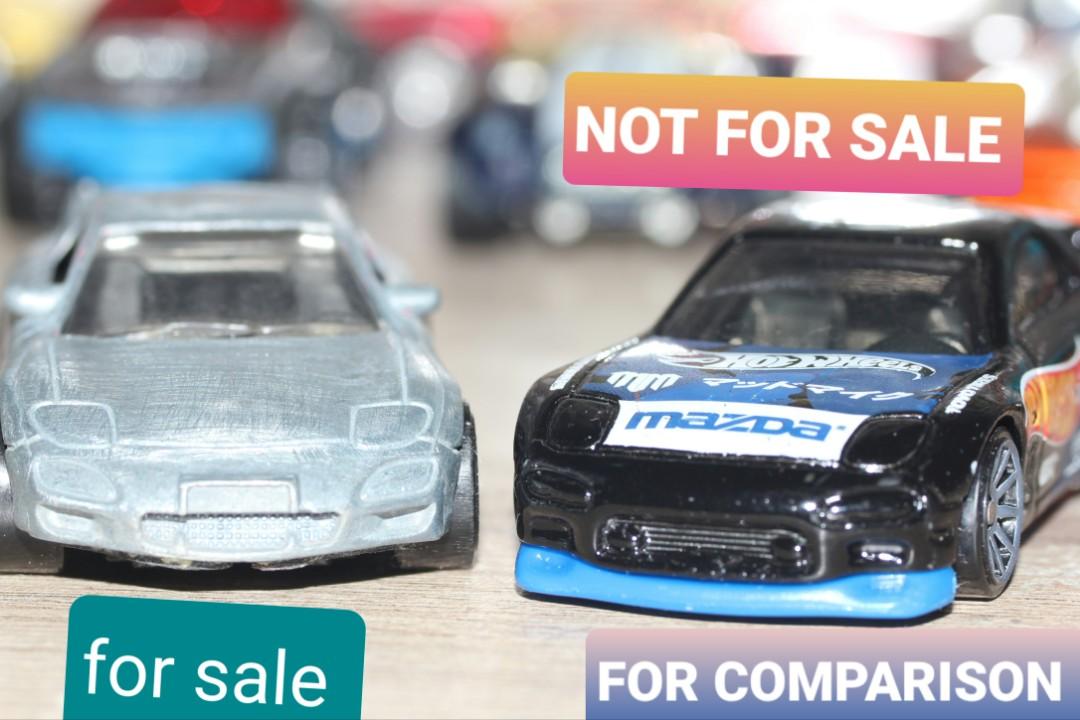 Bare metal no brand toy car Mazda RX7. Hot wheels rx7 for