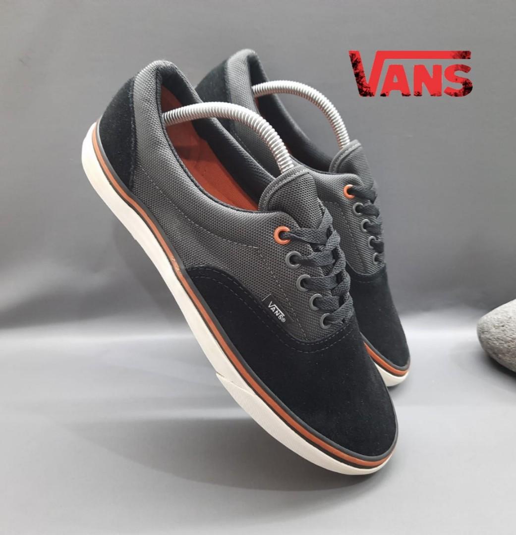 grey and orange vans