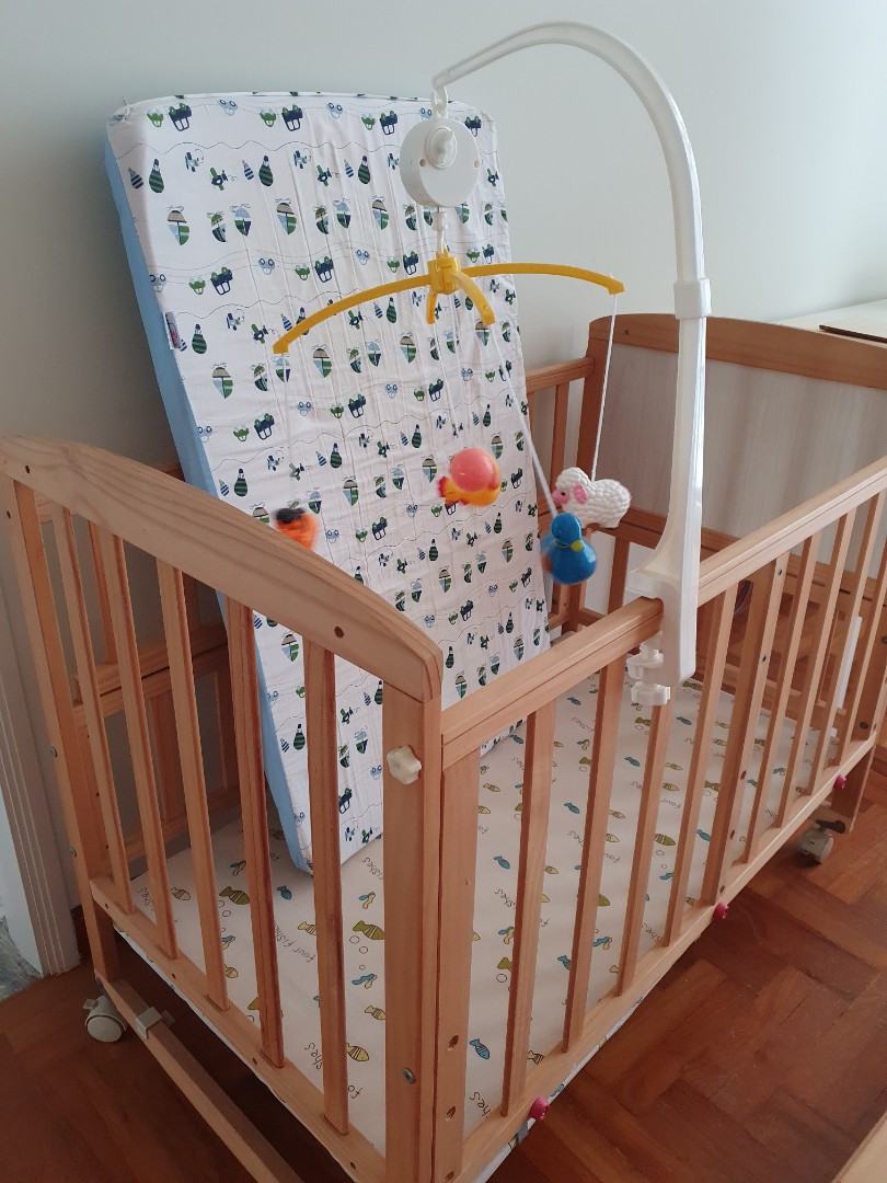 Wooden slick baby cot with wheels, Babies & Kids, Baby Nursery & Kids