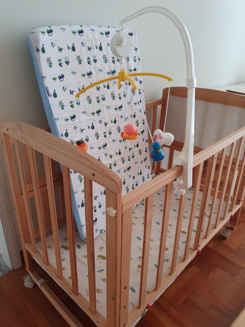 Wooden slick baby cot with wheels, Babies & Kids, Baby Nursery & Kids