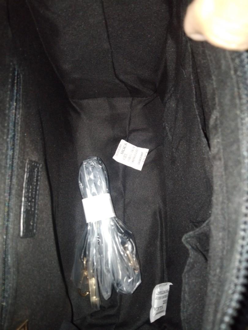 Badgley Mischka Hand and Sling Bag (Category: Luxury Bags & Wallets) located in Romblon. Submitted by migustyles (Listing ID 1115979351, Image 3). Description: Badgley Mischka Hand and Sling Bag Vegan Leather Black Brandnew and Authentic Bought in USA.