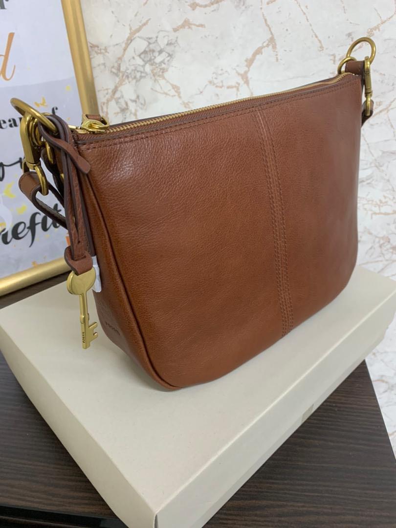 Fossil sales sling backpack