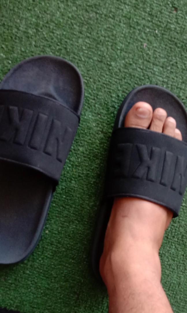 shrunken nike slides