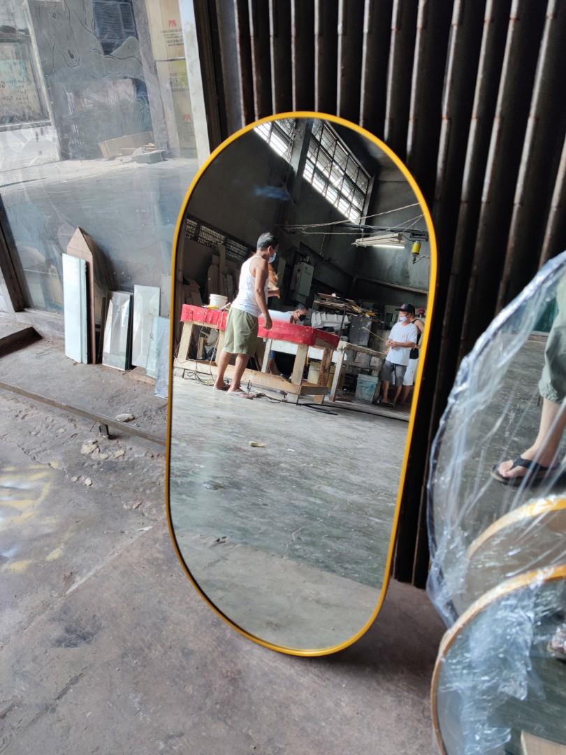 Oval mirror with frame (Category: Mirrors) located in Malabon City. Submitted by mirrors.ph (Listing ID 1116125973, Image 2). Description: Oval mirror with gold aluminum frame and plywood backing. Using 6mm thick copper free lead free mirror. Size: 1.5ft x 3ft P1215 Add P200 if with back hook Available in gold, glossy black, matte black, white and silver aluminum frame. Customize sizes and shapes are welcome..