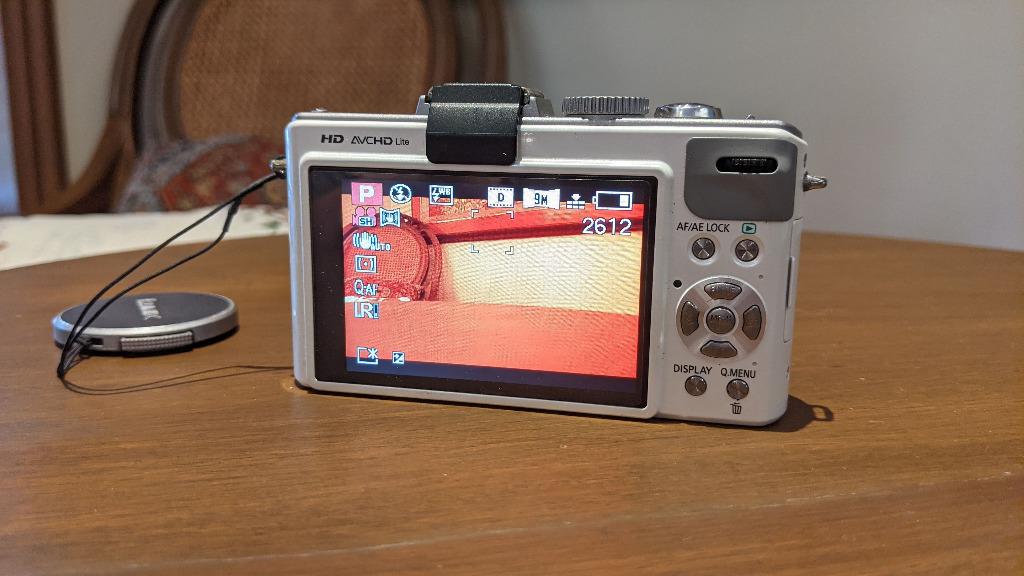 Panasonic Lumix DMC-LX5 Camera (White) (Category: Cameras) located in Muntinlupa City. Submitted by jmpalma88 (Listing ID 1116141573, Image 3). Description: This is my wife's old Lumix LX5 from our college days circa 2010-2011. Used when travelling and for school. Still works fine. Sold as BUNDLE ONLY. Includes the following: - 16GB SD Card - USB connector for PC/Mac - Battery charger + power cord - Brown leather case with lanyard - Instruction m